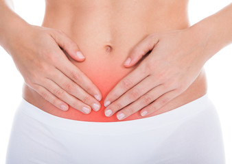 Woman Suffering From Stomach Ache