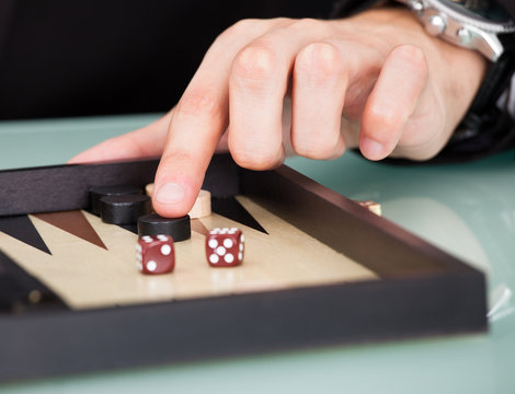 Businessman Playing Backgammon
