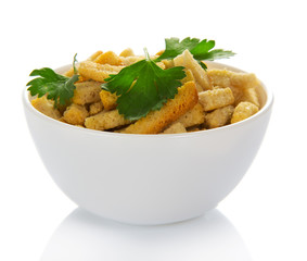 Croutons decorated with parsley in cup