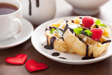 Belgian waffle with chocolate raspberry and hearts for Valentine