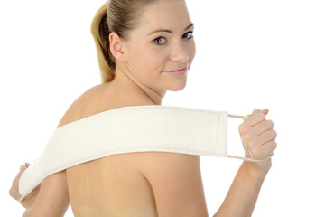 Frau massiert Rücken mit Massagegurt