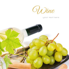 Bottle of white wine with fresh grape