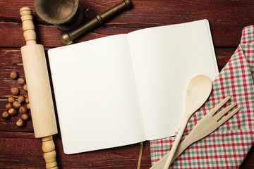 Fototapeta na wymiar Blank recipe book on wooden table