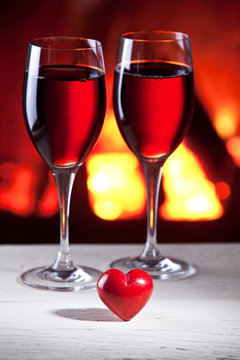 Wine glasses and a heart.
