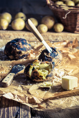 Closeup of jacket potatoes with butter