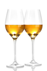 Wineglasses with white wine, isolated on white