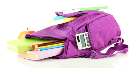 Purple backpack with school supplies isolated on white