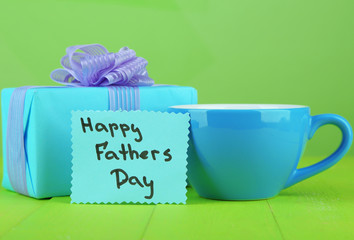 Happy Fathers Day tag with gift box and cup,