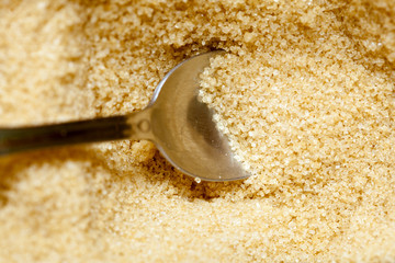 Close up brown sugar with spoon