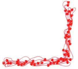 Heart-shaped beads on string isolated on white