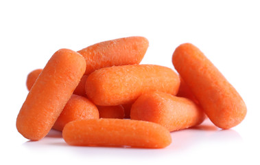 Baby carrot sticks isolated on white