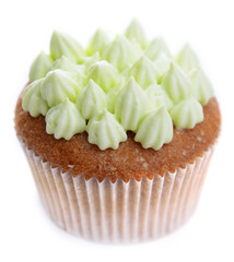Tasty cupcake with butter cream, isolated on white