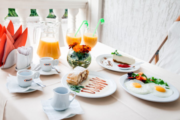 Romantic breakfast for two on table