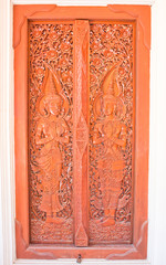 wood door at temple in northern,thailand.