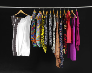 Female Variety of clothes hanging on the rack