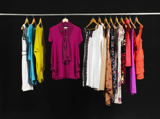 Female Variety of sundress clothes hanging on the rack