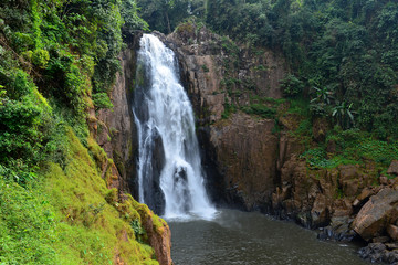 Fototapeta na wymiar High Cliff Waterfall