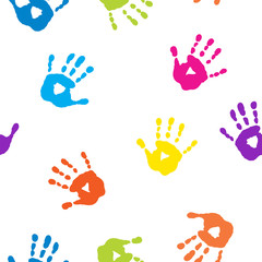 Seamless pattern with colorful handprints