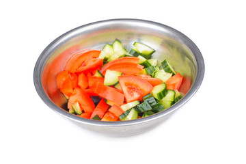 Fresh salad in metal bowl isolated on white