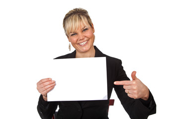 Fototapeta premium Studio portrait of a cute blond girl holding a piece of paper