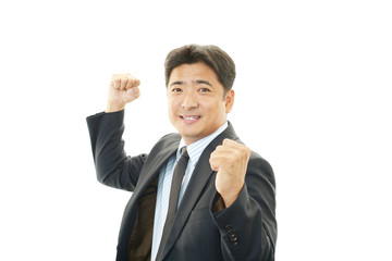 ガッツポーズのビジネスマン