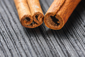 cinnamon on the wooden background