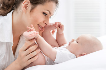 Portrait of happy mother and baby