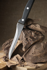 Cocoa mass and knife