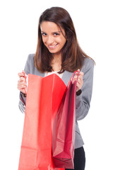 young woman with red shopping bag