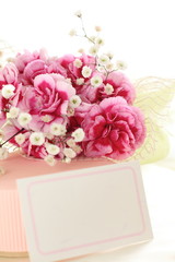 pink carnation and gift for mother's day image
