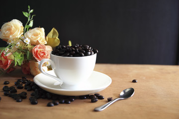 Cup full of coffee beans