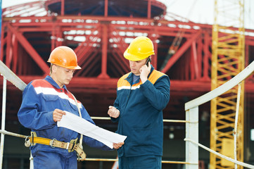 Engineers builders at construction site