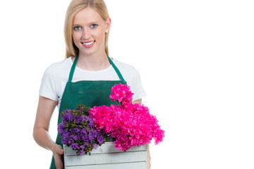 gärtnerin präsentiert blumen
