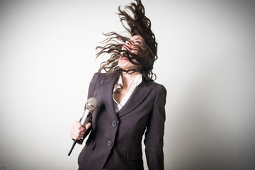 singing beautiful young businesswoman