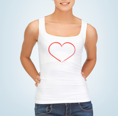 woman in white tank top with heart on it