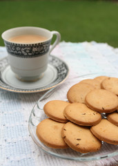Tray full of biscuits served with tea
