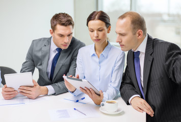 business team with tablet pc having discussion