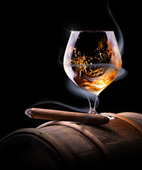 Cognac glass shrouded in a smoke