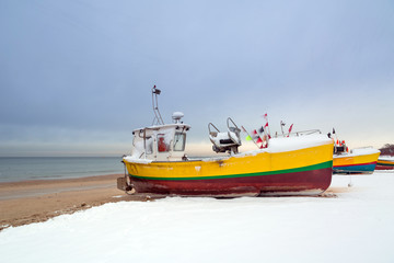 Fototapeta premium Winter scenery of fishing boats at Baltic Sea in Poland
