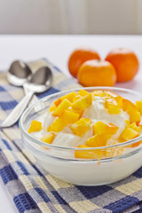 cream cottage cheese with sliced persimmons
