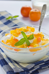 cream cottage cheese with sliced persimmons