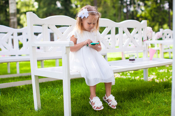 Adorable little girl at a wedding ceremony