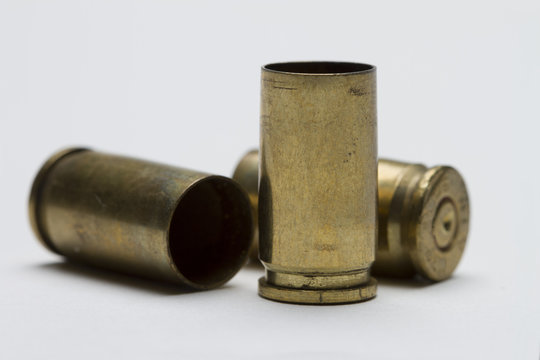Three bullet shells, horizontal