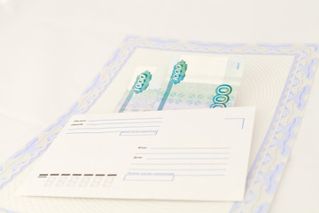 Деньги в конверте на бланке с защитой