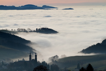 St. Peter in black forest, Germany, above clouds