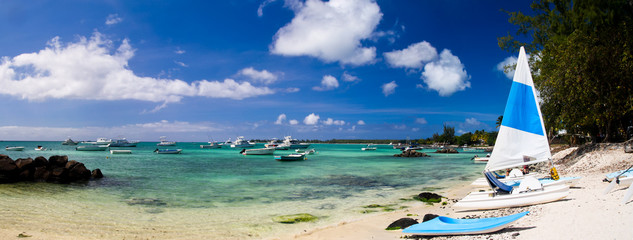 Tropical beach with boats