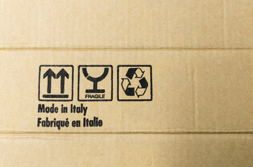 DETAIL OF CAPTION PRINTED ON A CARDBOARD BOX