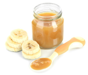 Baby puree with bananas isolated on white