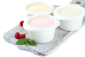 Delicious yogurt with berries isolated on white