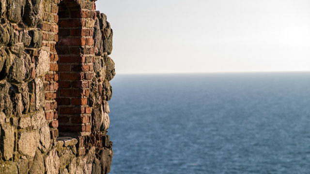 Ruin wall with view of the sea
